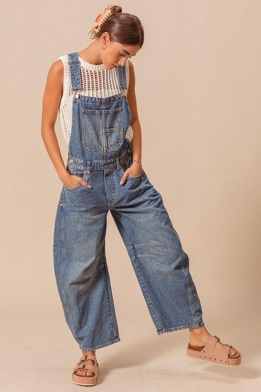 Washed Denim Slochy Pants Overalls Jumpsuit 100% Cotton Barrel Leg Overalls Outfit, Wide Leg Cotton Overalls For Fall, Cotton Wide Leg Overalls For Fall, Medium Wash Relaxed Fit Denim Jumpsuit With Bib Front, Medium Wash Relaxed Fit Bib Front Jeans, Dark Wash Wide Leg Overalls With Pockets, Denim High-rise Jumpsuits And Rompers With Pockets, High Rise Denim Jumpsuits And Rompers With Pockets, Wide Leg Dark Wash Overalls With Pockets