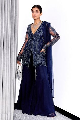 Midnight blue kurta with glass bead, cutdana, sequin embroidery in floral pattern. Paired with flared pant and dupatta. - Aza Fashions Elegant Blue Palazzo Set For Reception, Blue Sharara For Evening Eid, Elegant Blue Sharara For Formal Occasions, Blue Embellished Evening Set, Embellished Blue Evening Sets, Elegant Blue Sequined Sets, Elegant Blue Sets With Sequins, Glamorous Blue Embellished Sets, Blue Hand Embellished Sets For Evening