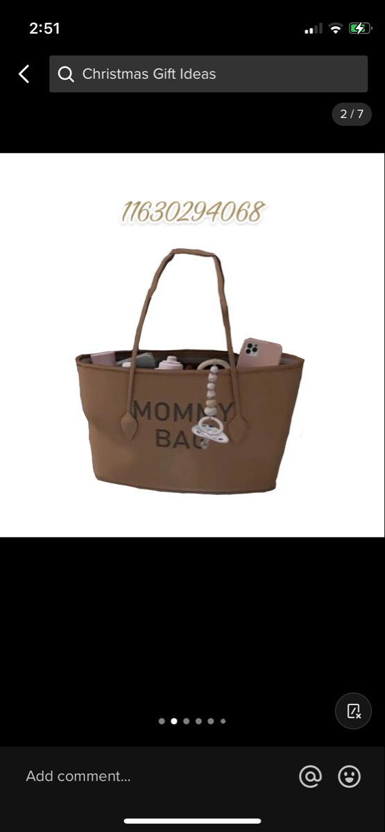 a brown handbag with the words mom ba on it and an image of a woman's purse