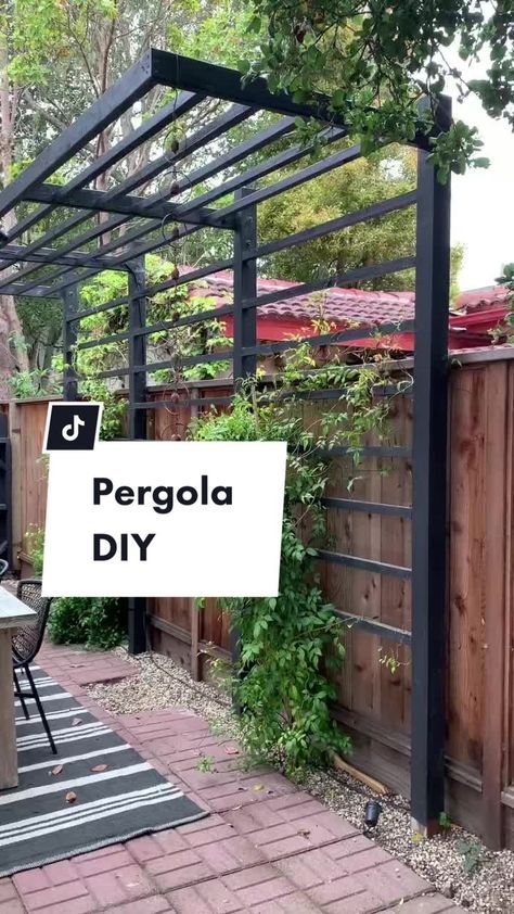 the pergola diy sign is in front of an outdoor grill and table