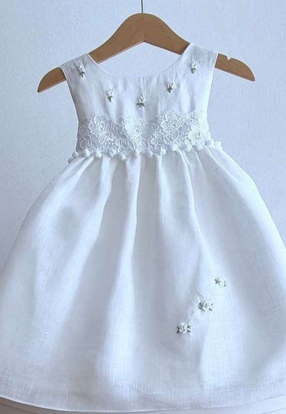 Boho linen White dress Baptism / Birthday / Wedding formal outfit Couture elegant embroidery lace Made in Greece ♥ DESCRIPTION Outfit set contains : dress headband hat (optional) - assorted with the dress Size options available Wrapped in elegant packaging ♥ Shoes variety to choose here : http://etsy.me/1Ozon2p Complete baptism sets here : https://etsy.me/2Otn0bh ♥ AFTER CONTACT Options Rush order help Order catholic christening gown Create the event, based on the color, environment, theme , sty Summer First Communion Dress With Lace Bodice, Summer Lace Bodice Dress For First Communion, Summer Baptism Dress With Lace Bodice, Elegant First Communion Dress For Summer, Elegant Spring First Communion Dress With Lace Bodice, Elegant First Communion Dress With Lace Bodice For Spring, Elegant First Communion Dress For Spring, Elegant First Communion Dress With Lace Trim For Spring, Elegant Spring First Communion Dress