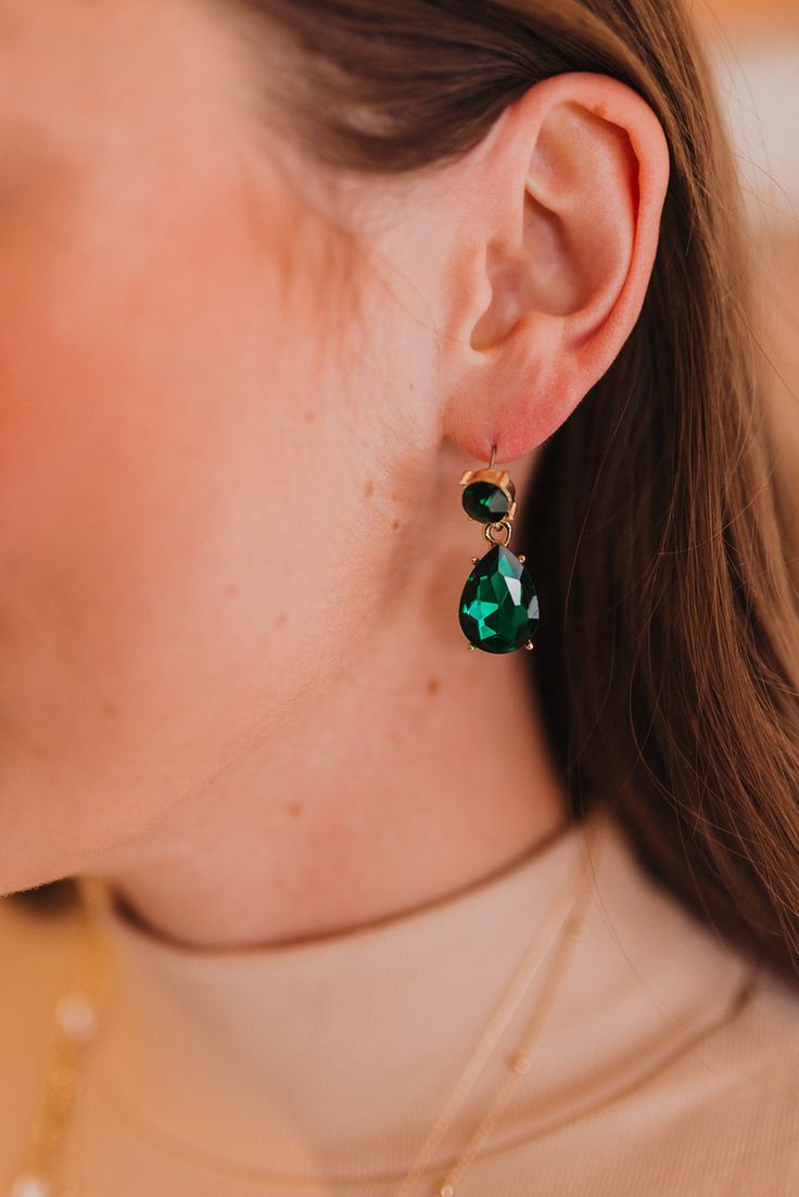 Features a teardrop emerald green drop earring. Such a great statement earring to add color to any outfit! -Length: 1.25" -Post back Green Teardrop Pendant Jewelry With Matching Earrings, Green Drop Crystal Earrings For Party, Green Teardrop Earrings For Party, Green Emerald Teardrop Earrings, Elegant Green Teardrop Earring (single), Elegant Green Teardrop Pendant Earrings, Elegant Green Teardrop Single Earring, Party Jewelry With Teardrop Emerald, May Birthstone Teardrop Jewelry For Parties