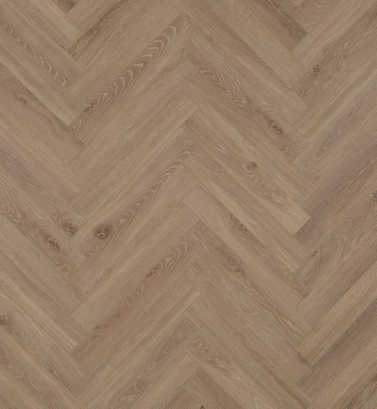 an image of wood flooring that looks like herringbones