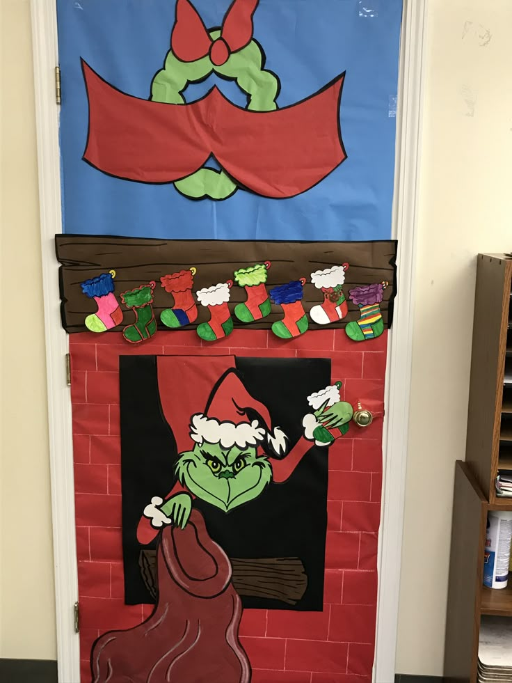 the grinch door decoration is on display