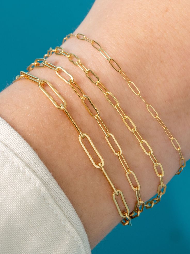 We can’t get enough of the paperclip trend! Our medium link style will add to your stack without overwhelming it, and is our second largest option available from our Paperclip Collection. Mix and match with different sizes and pieces from the collection for especially on-trend stack. Paperclip Chain Link Bracelet, Paperclip Bracelet With Rectangular Links And Lobster Clasp, Modern Paperclip Bracelet With Oval Link Cable Chain, Modern Oval Link Paperclip Bracelet With Cable Chain, Everyday Paperclip Link Bracelet, Modern Paperclip Bracelet With Delicate Chain For Everyday, Rectangular Paperclip Bracelet With Lobster Clasp, Modern Everyday Paperclip Bracelet With Delicate Chain, Yellow Gold Paperclip Bracelet