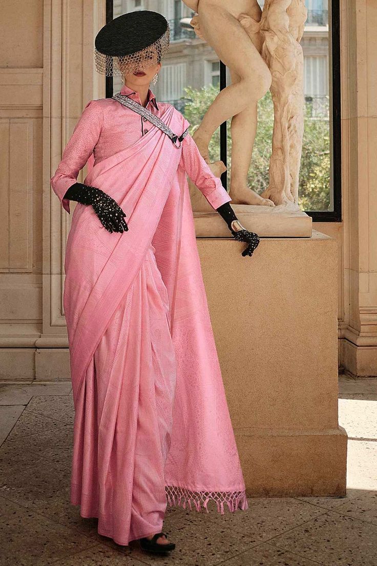 About this Product Saree: Saree Color: Pink Saree Fabric: Satin Saree Work: Printed Saree Pattern: Block Print Drape Style: Choose the drape style while order: Standard Open, Pleated or Gujarati Saree length: 5.5 meters Petticoat: Saree comes with an in-built butter crepe petticoat, no additional petticoat is required to wear with the saree. Sizing: Waist is adjustable +/- 1 size with a partial elastic waist band that falls under the drape for added comfort. Blouse: Optional Blouse: Blouse Style Satin Silk Saree, Silk Sarees Online Shopping, Block Print Saree, Ethnic Sarees, Satin Saree, Buy Sarees Online, Light Pink Color, Woven Design, Traditional Sarees