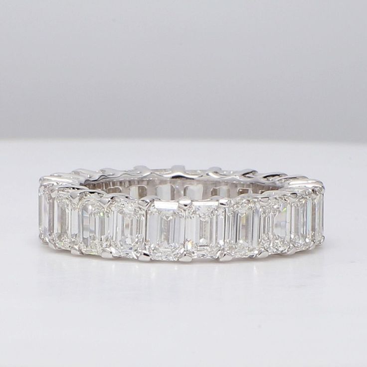 Ninacci 14K White Gold Eternity Band with Shared Prong Set Emerald-Cut Diamonds - 7.15 Carat Total Diamond Weight - Size 7 Luxury Modern Eternity Band With Prong Setting, Emerald Cut Cubic Zirconia Eternity Band With Baguette Diamonds, Radiant Cut Eternity Band With Prong Setting, Luxury Emerald Cut Eternity Band With Diamond Accents, Timeless Emerald Cut Eternity Band For Wedding, Elegant Radiant Cut Diamond Eternity Band, Emerald Cut Moissanite Eternity Band In Fine Jewelry Style, Luxury White Emerald-cut Eternity Band, Wedding Emerald-cut Lab-grown Diamond Eternity Band