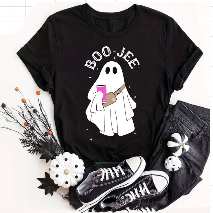 Boo-Jee Halloween Ghost T-Shirt Unisex Unisex T-Shirt Customized This Preshrunk 100% Cotton Tee Brand: Gildan Adult Size Most 100% Cotton Preshrunk Machine Wash Cold With Like *** Let Me Know Your Size Before Purchase ** Available Sizes: Small/ Medium/ Large/ Extralarge/2xl Measurements Are Shown In Pictures! You Can Ask For Other Sizes Or Colors Before Purchase! I Can Customize Special Orders By Request, Remember The Price Depends On The Design You Request. Let Me Know If You Have Any Questions Halloween Black T-shirt With Character Print, Novelty Black T-shirt With Character Print, Black Spooky T-shirt With Funny Print, Spooky Black T-shirt With Funny Print, Black Novelty T-shirt With Character Print, Black Novelty Short Sleeve Tops, Black Short Sleeve Novelty Top, Novelty Black Short Sleeve T-shirt, Black Novelty Short Sleeve T-shirt