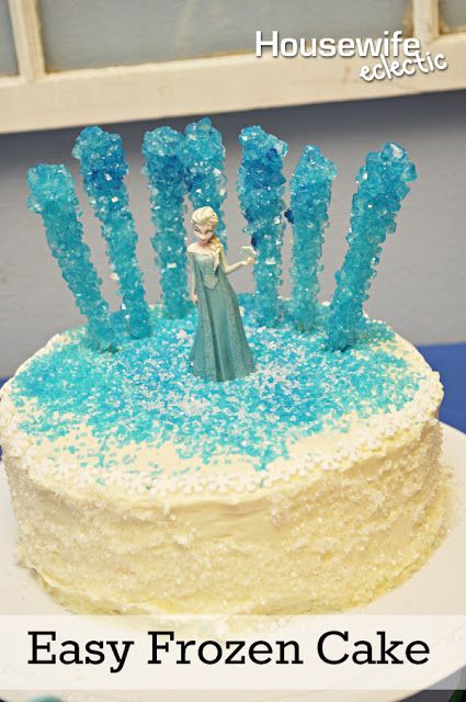 there is a cake with frosting and blue icing on it that says easy frozen cake