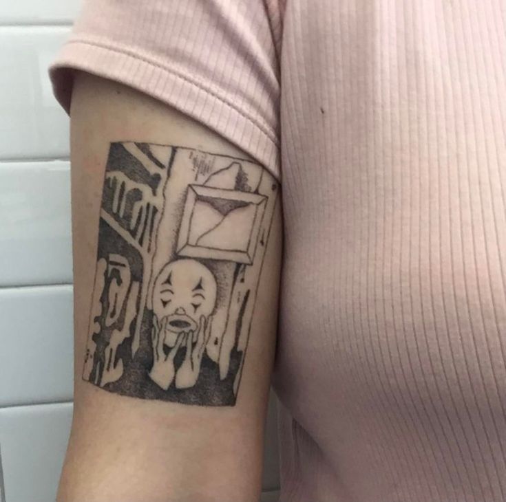 a woman's arm with a tattoo on it that has an image of a dog