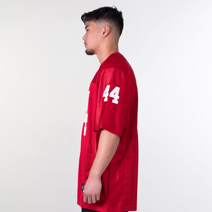 A classic throwback of the Forest Gump Alabama Football Jersey has landed at Jersey Nation. Inspired by the fan favorite movie and made with breathable mesh with sweat-wicking technology to help keep you cool and dry whether you’re burning up the field or just keeping it casual around town. This jersey is a must-have this season. Available now at Jersey Nation while stock lasts!- Forest Gump Alabama Football Jersey- Fully embroidered graphics: Team, Name, Number detailing, logo- Premium tackle t Red Varsity Jersey For Streetwear, Collegiate Breathable Streetwear Tops, Casual Moisture-wicking Baseball Jersey For Fans, Red Sporty Jersey For Fans, Red Sporty Streetwear Jersey, Red Sporty Baseball Jersey For Fans, Red Jersey For Streetwear, Casual Jersey For Football Season Streetwear, Sporty Team Logo Jersey For Streetwear