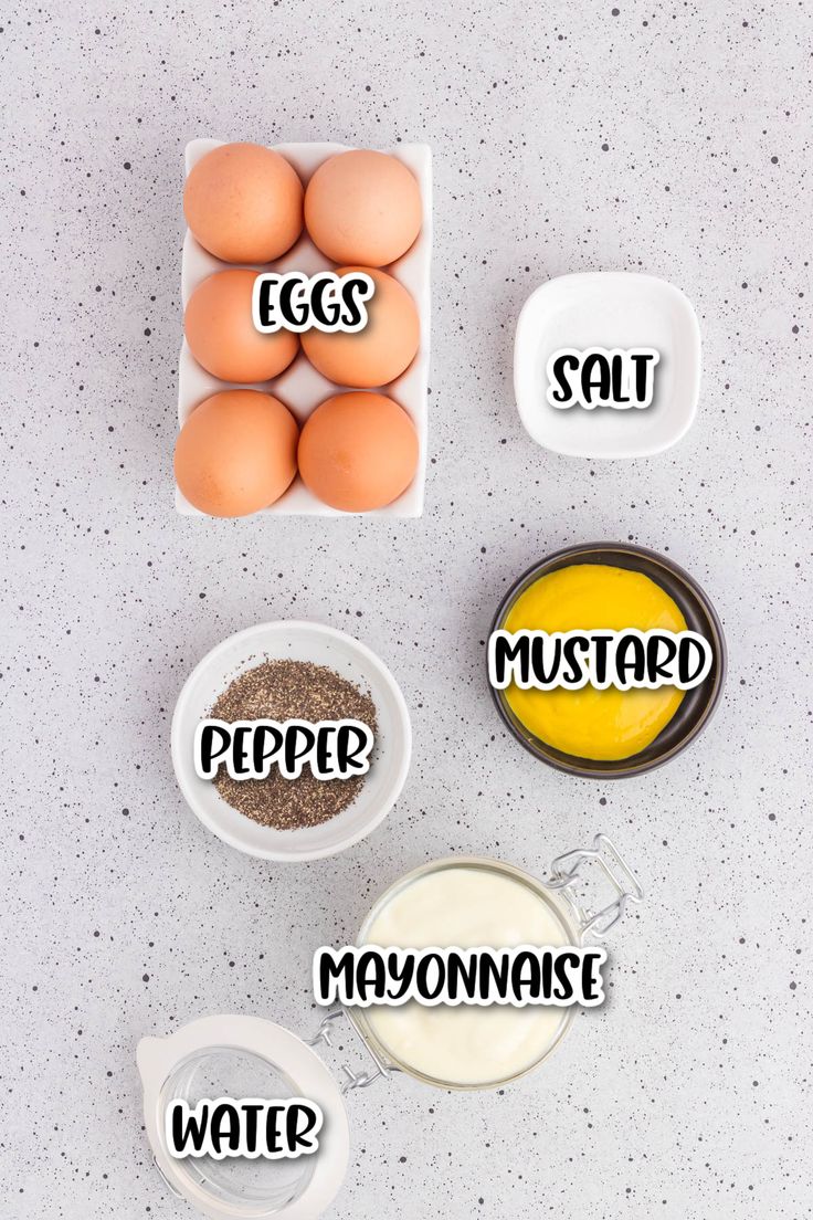 eggs, salt, pepper, and mayonnaise in bowls with words on them