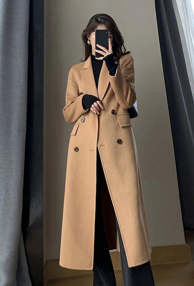 This luxurious double-face wool blend coat for women is the perfect choice for sophisticated and stylish individuals. It is fitted to perfection, and features a double-breasted cut and an elegant, long silhouette for a timelessly fashionable look. Long sleeves Notched lapels Front double-breasted button closure Front flap pockets 50% Wool, 50% polyester Machine wash, tumble dry Women's outerwear Item #3103131 Size info XS=US2=UK6=EU32 S=US4-6=UK8-10=EU34-36 M=US8-10=UK12-14=EU38-40 L=US12=UK16=E Long Trench Coat Women, Mantel Outfit, Trench Coats Women Long, Camel Wool Coat, Coat Korean, Winter Outwear, Winter Trench Coat, Fitted Coat, Wool Coat Women