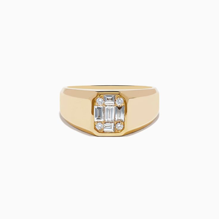 a yellow gold ring with two baguettes and diamonds on the front, set against a white background