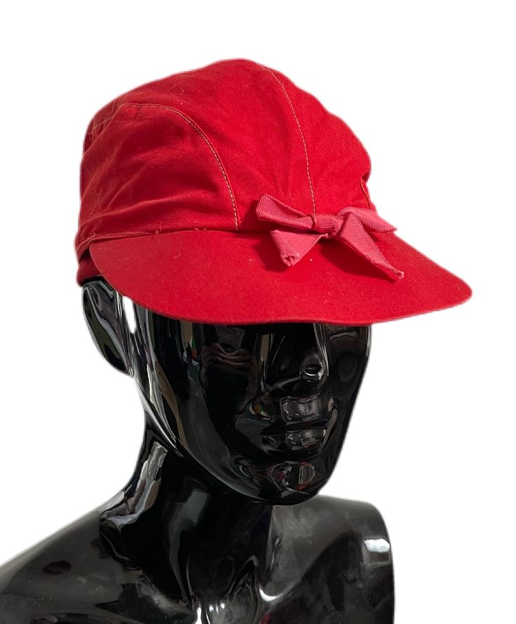 "This is a great Saks cotton 1940's cap. It's made of red cotton and has ear flaps which can be pulled down. It has a small bow on the front and is made from cotton.  The overall condition is good. The front peak is very slightly bent but still looks fine. There are a few tiny age related marks nothing that detracts from the piece.  Interior diameter is approx 21\"	in stock	72.36 USD	"	24.94 USD	Accessories > Hats & Caps > Sun Hats & Visors > Sun Hats
https://i.etsystatic.com/6390059/r/il/218e44 1920s Blouse, 80s Hats, Fitted Jumper, Wool Poncho, Small Bows, Novelty Print, Beautiful Blouses, Style Ideas, Sun Hats