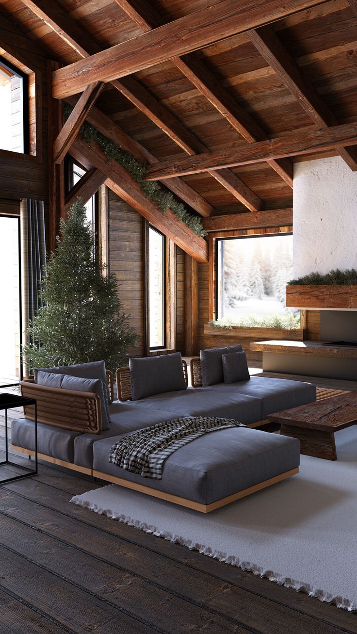 a living room filled with furniture next to a window covered in wooden planks and windows