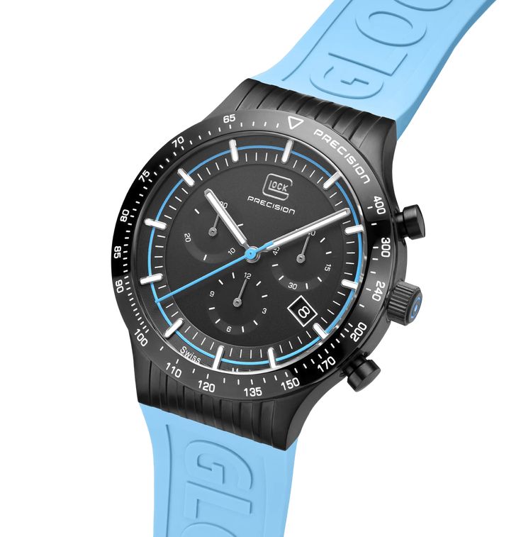 GW-34-2-24 Encased in brushed black stainless steel, this watch boasts a blue silicone strap with GLOCK lettering. Powered by a Swiss movement, it guarantees timekeeping accuracy. Enhanced by a chronograph function, hands and indices with Swiss Super-LumiNova®, and a 20 ATM water-resistance rating, it represents precision, reliability, and style. Blue Chronograph Watch With Stopwatch, Modern Chronograph Watch With Subdials For Sports, Modern Chronograph Watch For Sports, Modern Sports Chronograph Watch With Round Dial, Modern Sports Chronograph Watch, Blue Sporty Watch With Stopwatch, Modern Blue Digital Watch With Subdials, Blue Chronograph Watch With 10atm Water Resistance For Business, Blue Sports Watches With Analog Display