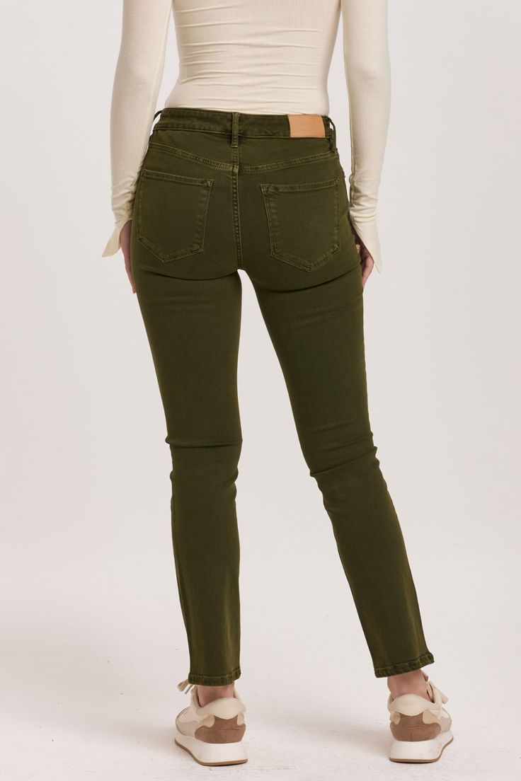 Mid rise slim straight leg jeans. The standout fit that comfortably rests slightly lower on the waist, shaping up effortlessly from the hip to mid thigh. Full inseam on stretch denim with designer color palettes, washed and brushed for softness.9 1/2" Front Rise (include waistband), 13 1/2" Leg Opening, 30" inseam (Size 27) SUPER STRETCH: Plenty give, may go down one size 90% COTTON 8% POLYESTER 2% SPANDEX Machine wash cold, Tumble dry low Imported Zip fly and button closure Five-pocket style Green Tapered Leg Jeans For Fall, High Rise Green Cotton Jeans, Green High Rise Cotton Jeans, High Rise Green Flare Jeans With Five Pockets, Green High-rise Flare Jeans With Five Pockets, Green High Rise Flare Jeans With Five Pockets, Green High Rise Relaxed Fit Jeans, Green Mid-rise Relaxed Fit Jeans, Trendy Green Relaxed Fit Jeans