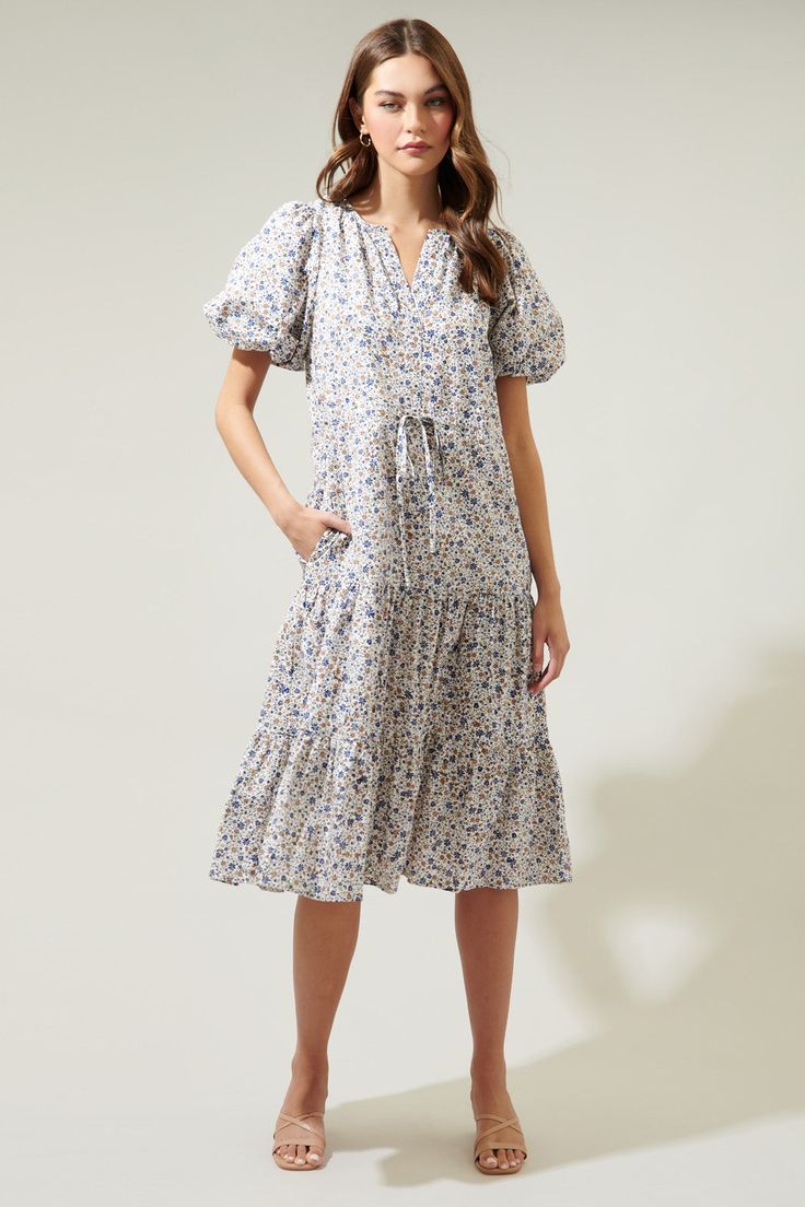 Heath Floral Balloon Sleeve Tiered Midi Dress – Sugarlips Spring Tiered Dress For Daywear, Tiered Floral Dress With Ditsy Print For Garden Party, Tiered Ditsy Floral Dress For Garden Party, Garden Party Tiered Floral Dress With Ditsy Print, Spring Ditsy Floral Print Midi Dress For Daywear, Spring Midi Dress With Ditsy Floral Print For Daywear, Tiered Ditsy Floral Print Dress For Spring, Spring Daywear Midi Dress With Ditsy Floral Print, Spring Tiered Dress With Ditsy Floral Print