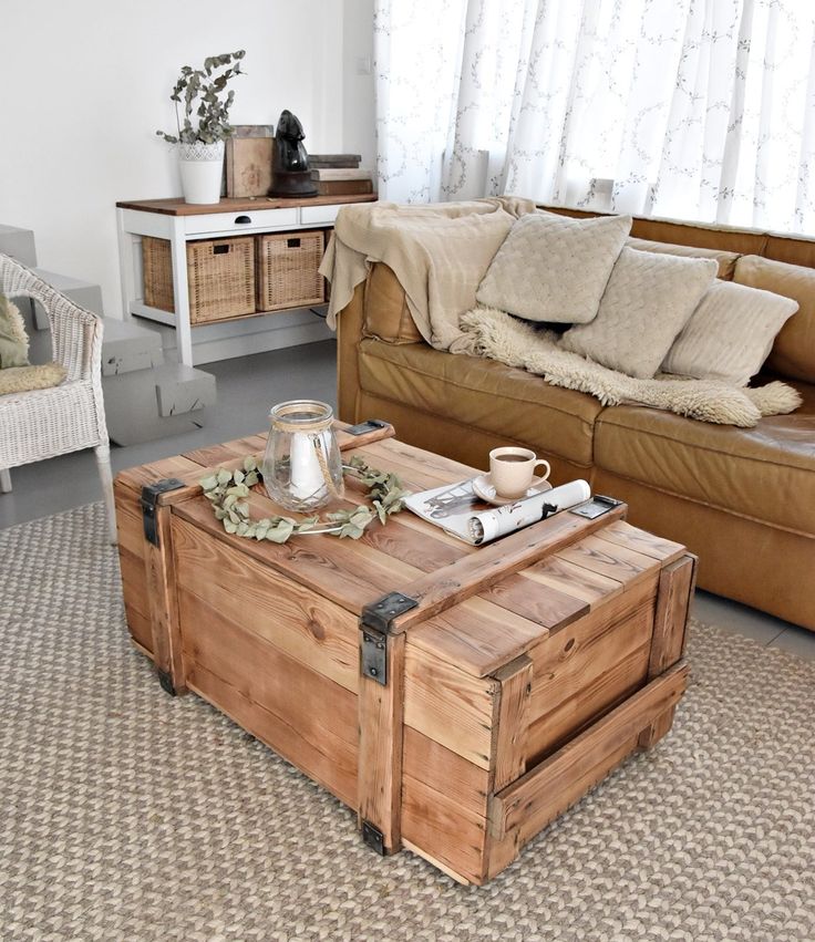 a living room with two couches and a coffee table in the middle of it