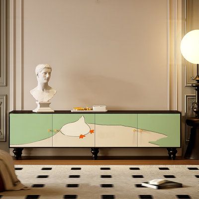 a living room with a white and green cabinet next to a busturine on the wall