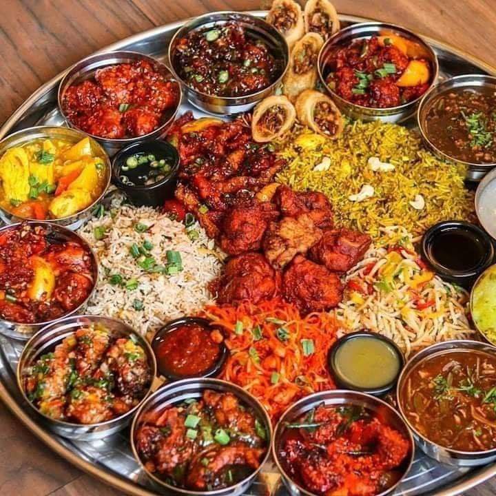 a platter filled with lots of different types of food