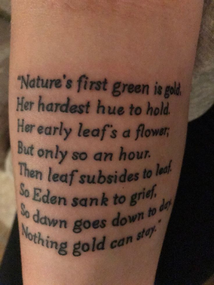 a person with a tattoo on their arm that reads, nature's first green is gold her hardest he to hold her early leaf's a flower but only so an hour