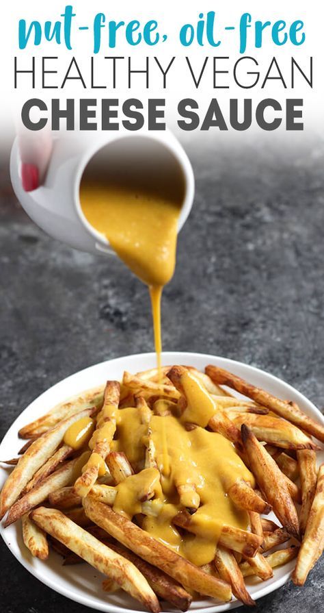 cheese sauce being drizzled over french fries on a white plate with the words, nut - free, oil - free healthy vegan cheese sauce