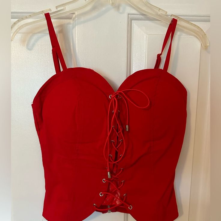 Nwt Biker Chic Vibes! 13” From Top Of Bust To Bottom, P2p 16” (With Stretch), Adj Straps, Lovely Inflated Lace. Zip Back And Adj Front! Very Stretchy! Gotta Luv This One! Red Tops With Built-in Bra And Tank Straps, Red Strappy Crop Top For Summer, Fitted Red Tops With Straps, Red Tank Top With Straps For Party, Fitted Red Camisole With Built-in Bra, Fitted Red Tank Top With Built-in Bra, Red Crop Top With Built-in Bra For Party, Fitted Red Crop Top With Straps, Red Spaghetti Strap Top For Night Out