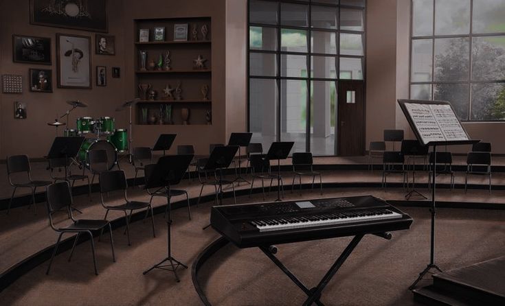 an empty room with chairs and musical instruments