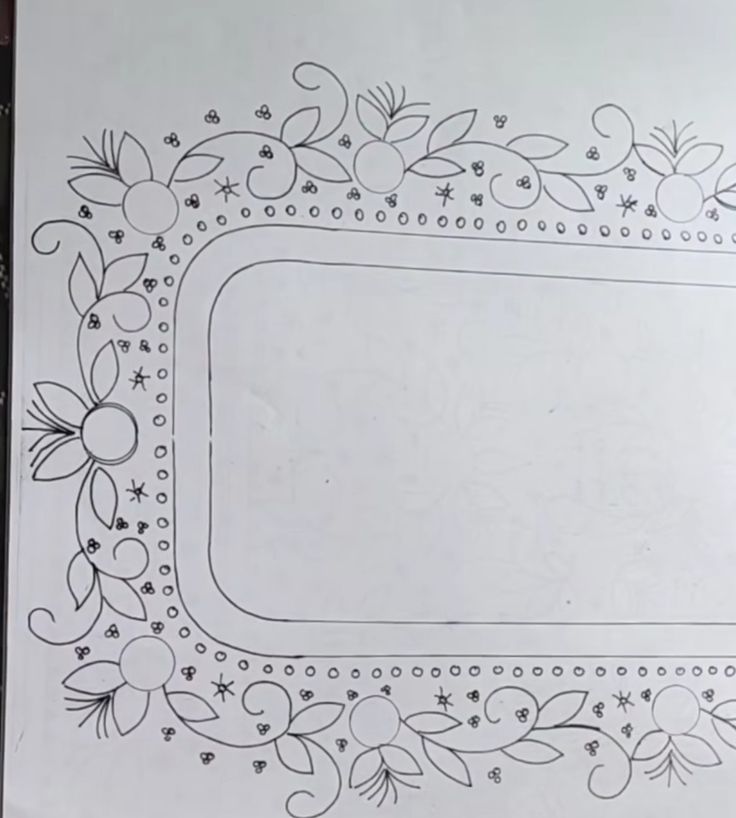 a white paper with an ornate design on it