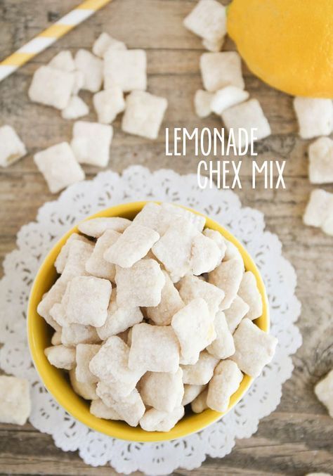 lemonade chex mix in a yellow bowl on a white doily next to an orange