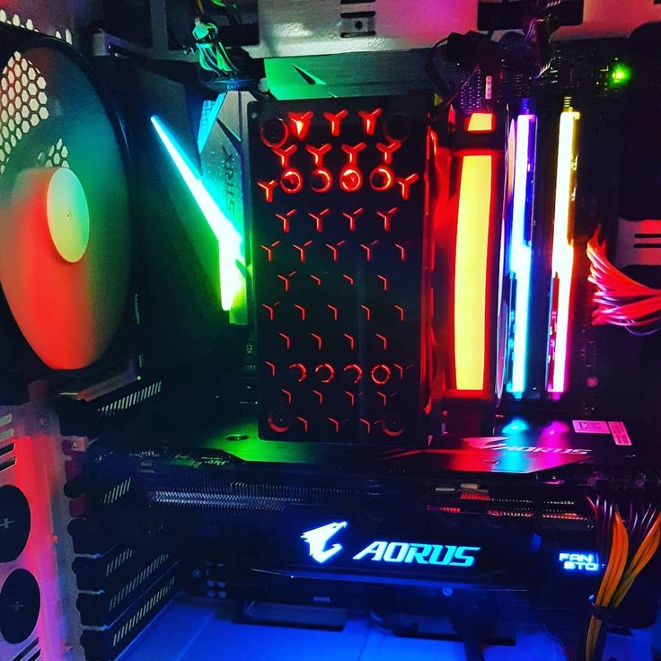 the inside of a computer case with neon lights