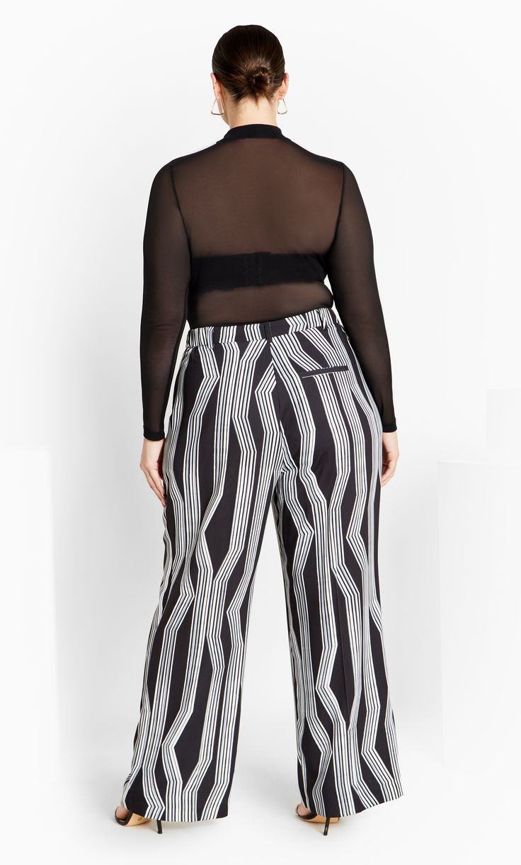 Turn heads in the gorgeous print stylings of our Lalia Print Pant. Complete with a wide leg cut and high waist, these pants are as chic as they are on-trend. Key Features Include: - Flat belt looped waistband - Front pleat detail - Double hook & eye fastening - Functional side pockets - Relaxed culotte leg - Full length - Unlined - Soft touch, slight stretch fabrication Style with a buttoned blouse and statement earrings to complete your outfit. | Plus Size Laila Print Pant in Black Mono, Size 2 Plus Size Clothing Online, Print Pant, Plus Size Pants, Printed Pants, City Chic, Hook Eye, Black Pants, Statement Earrings, Plus Size Outfits