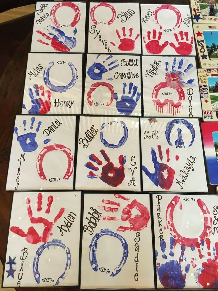 many handprints are displayed on the table