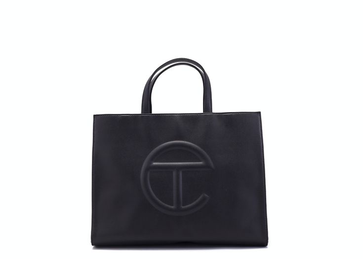 I just listed an Ask for the Telfar Shopping Bag Medium Black on StockX Black Shoulder Bag With Logo Hardware For Work, Black Shopping Bags With Logo Hardware, Chic Workwear Bags With Logo, Evening Black Shoulder Bag With Embossed Logo, Classic Work Bags With Logo, Elegant Tan Bag With Logo Hardware, Elegant Workwear Bags With Logo, Classic Black Bag With Embossed Logo, Formal Black Bags With Embossed Logo