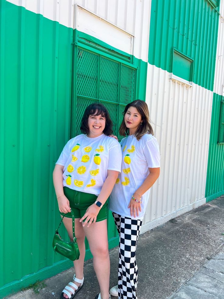 Add this oversized tee to your cart for your next adventure! There is nothing as cute as fruit print and this t-shirt is no exception! We love pairing graphic tees with colorful biker shorts, fun skirts, and denim. With its perfectly oversized fit, fun lemon print, and breathable fabric, it is hard not to fall in love. The cutest lemon print ever Perfectly oversized when you order your true size Lightweight fabric that is a breathable cotton 100% cotton Kristin is 5'8 wearing a size S/M and typi Short Sleeve Printed T-shirt For Day Out, Fun Summer Streetwear T-shirt, Cute Graphic Print T-shirt For Day Out, White T-shirt With Lemon Print For Summer, Oversized Fun T-shirt With Funny Print, Fun Oversized T-shirt With Funny Print, Fun White T-shirt With Fruit Print, Playful T-shirt For Summer Streetwear, White Fruit Print T-shirt For Summer