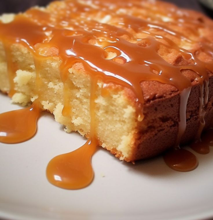 a piece of cake with caramel sauce drizzled on it