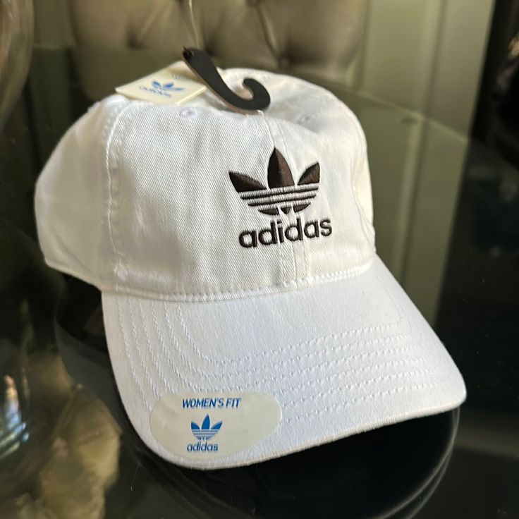 Brand New, Never Worn, White Womens Fit Hat Adidas Cotton Hat With Curved Brim, Adidas Cotton Hats With Curved Brim, Trendy White Hat For Streetwear, Trendy White Hats For Streetwear, Trendy White Streetwear Hat, Adjustable Adidas Cotton Hat, White Adidas Sporty Baseball Cap, Trendy White Baseball Cap For Streetwear, White Hats For Spring Streetwear