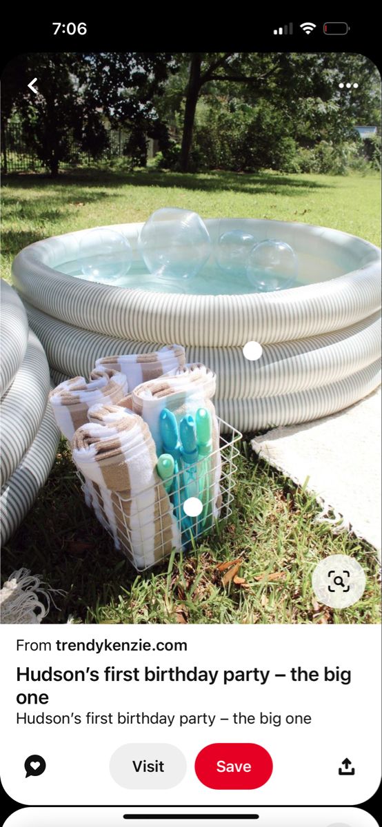 an inflatable pool is filled with bubbles and soapy water as it sits on the grass