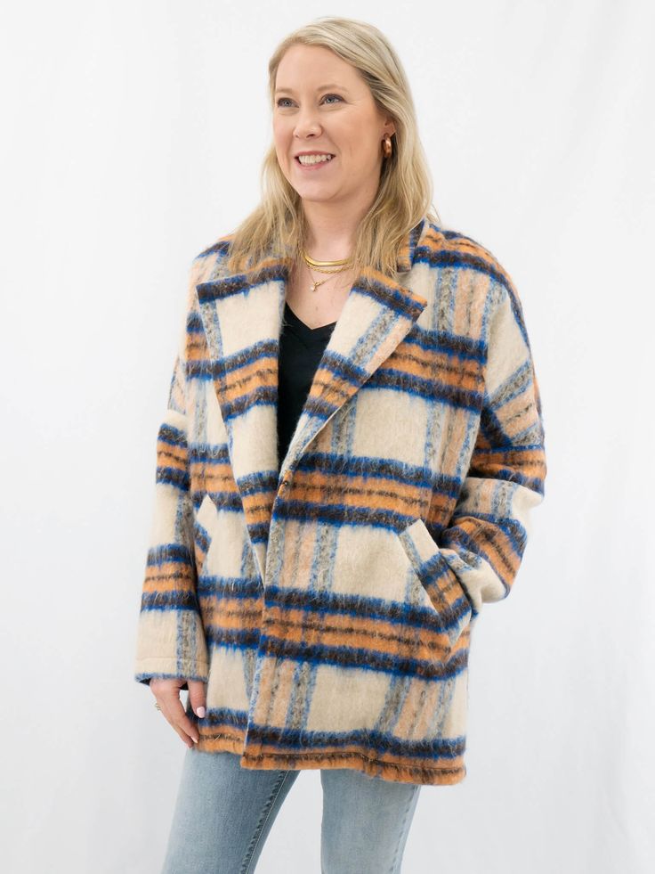 oversized plaid jacket on model Casual Oversized Wool Sweater Coat, Spring Plaid Wool Outerwear, Plaid Wool Outerwear For Spring, Plaid Wool Outerwear For Cold Weather, Plaid Wool Outerwear For Winter, Winter Plaid Wool Outerwear, Winter Wool Plaid Outerwear, Oversized Winter Shacket For Cold Weather, Cozy Fall Shacket For Cold Weather