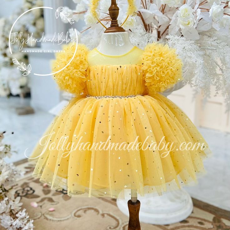 Welcome to our shop! We're delighted to have you here. Your satisfaction is our main goal, and we're happy to address any questions you may have about our products. Thank you for choosing us! ♥ Product Detail ♥ * Product Name: Yellow Tulle Dress * Product Type: Handmade * Product Material: Tulle, Satin, Cotton, Zipper. * Washable & Reusable * Stylish Short Sleeve Design * Soft and Comfortable to Wear ♥ Description ♥ Beautiful unique yellow dress, made out of bling tulle and lining. The simple st Cute Yellow Tutu Dress For Dress-up, Yellow Ruffled Dress For Baptism, Yellow Ruffle Dress For Baptism, Yellow Fitted Dress For Baptism, Fitted Yellow Dress For Baptism, Cute Yellow Princess Dress For Party, Cute Yellow Princess Party Dress, Yellow Princess Dress For Dress-up, Yellow Tulle Formal Dress