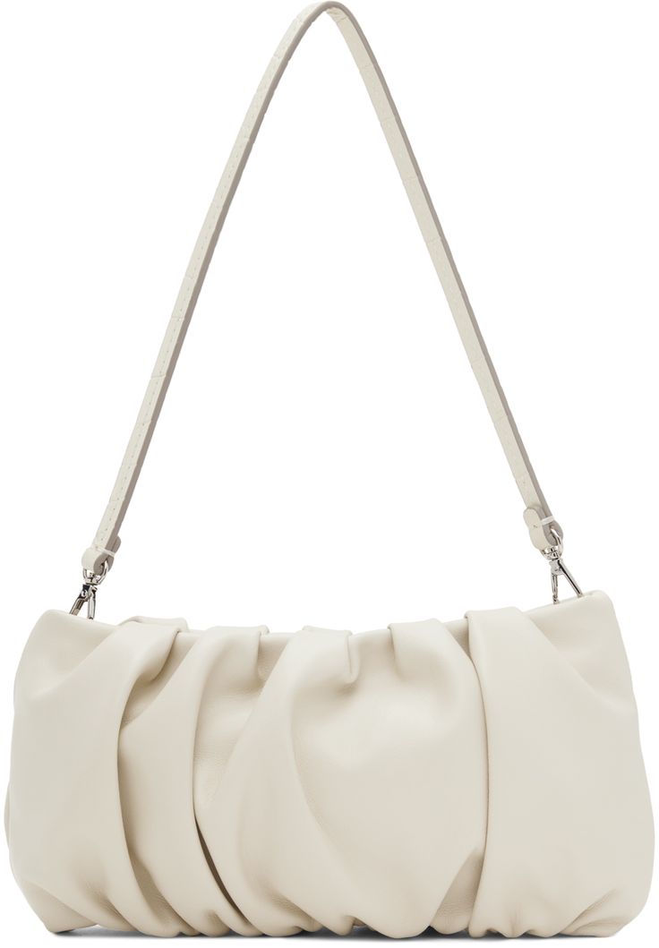 Grained leather shoulder bag in off-white. · Gathering throughout · Detachable shoulder strap · Zip closure · Patch pocket at interior · Suede lining · H4.5 x W9 x D1 Supplier color: Cream Staud Shoulder Bag For Everyday Use, Staud Shoulder Bag With Removable Pouch For Daily Use, Elegant Staud Shoulder Bag For Daily Use, Elegant Staud Shoulder Bag, Modern Staud Crossbody Shoulder Bag, Elegant Staud Shoulder Bag With Removable Pouch, Elegant Staud Crossbody Shoulder Bag, Elegant Staud Shoulder Bag With Adjustable Strap, Modern Staud Shoulder Bag With Adjustable Strap