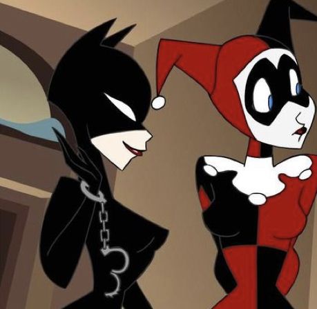 two cartoon characters dressed in black and red