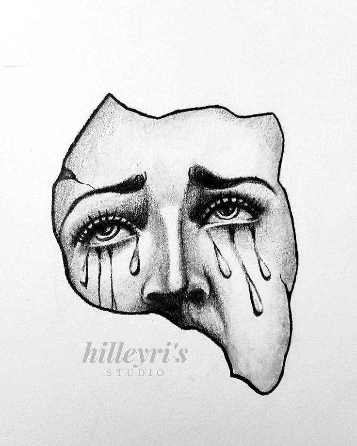 a drawing of a woman's face with tears