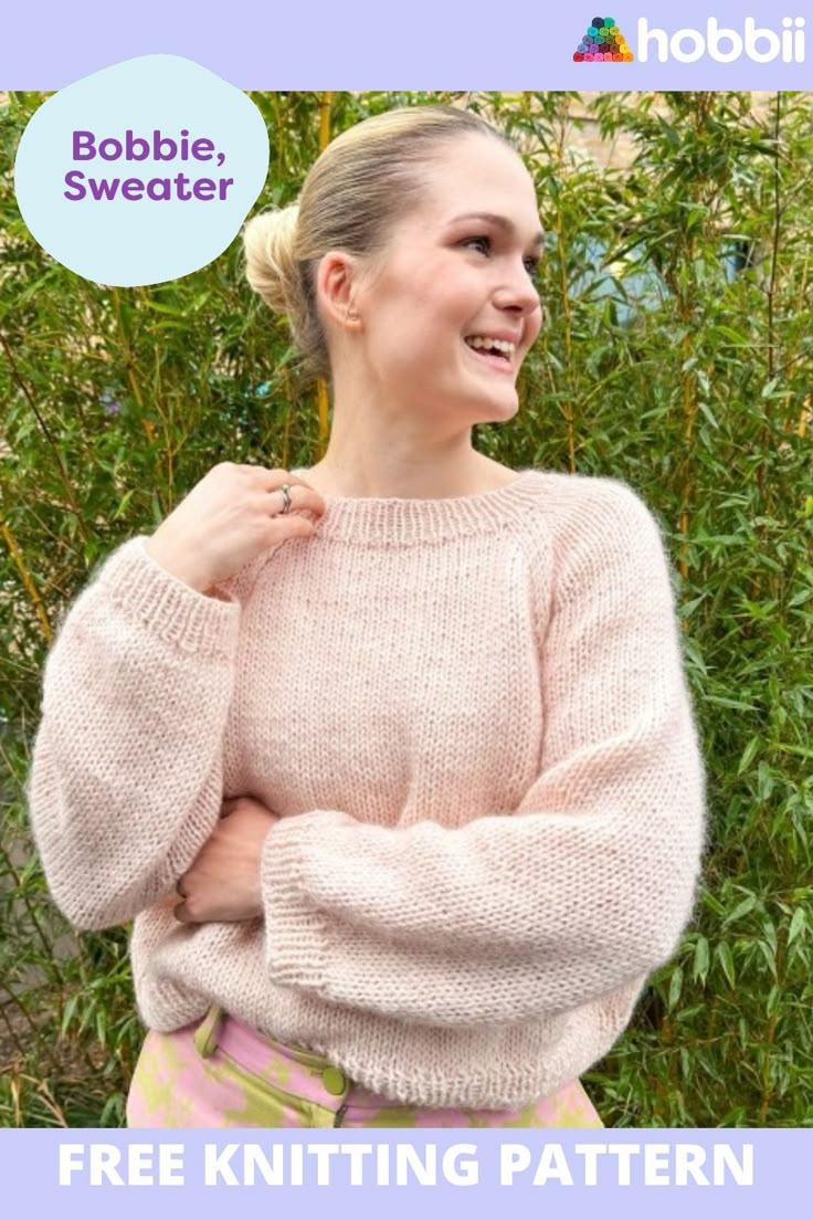 a woman wearing a pink sweater with the text, free knitting pattern for bobble sweaters