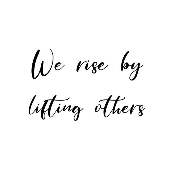 the words we rise by lifting others up in black ink on a white paper background