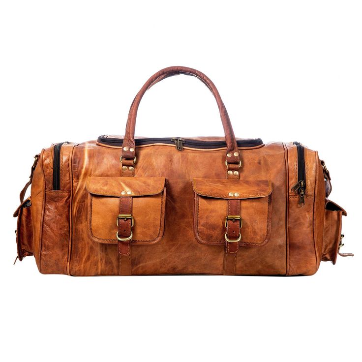 Trustpilot This weekender duffle bag has four big pockets in the exterior with buckle closure. This travel bag is made of genuine goat leather which gives it a rustic look which is for everyone who is looking for something heavy-duty but with good looks. This bag has three compartments, one big compartment for all your clothes and shoes, two small compartments with a zipper for all of your accessories. Salient Features Color: Light Brown Heavy handle and adjustable shoulder strap Genuine goat le Vintage Travel Bag With Multiple Pockets, Rectangular Travel Bag With Multiple Pockets, Brown Travel Bag With Pockets, Rectangular Duffle Bag With Pockets For Trips, Rectangular Weekender Bag With Pockets For Trips, Rugged Adventure Bag With Pockets, Leather Duffle Bag With Pockets For Overnight Trips, Brown Travel Bag With Multiple Pockets, Rugged Large Capacity Rectangular Travel Bag