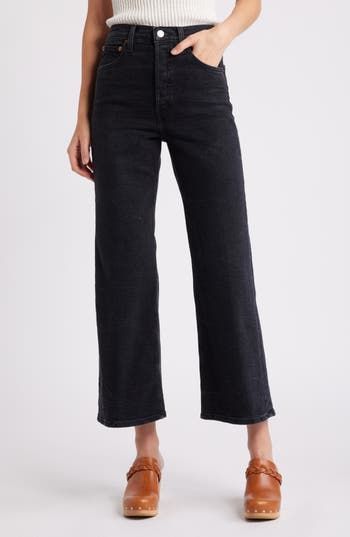 Wide legs and a cropped cut give these stretch-kissed jeans in a faded, stormy wash a retro vibe that's incredibly modern. Zip fly with button closure Five-pocket style 95% cotton, 4% elasterell-p, 1% Lycra® spandex Machine wash, tumble dry Imported Dark Wash Cropped Flare Jeans With Five Pockets, Washed Black Denim Flare Jeans For Work, Chic Dark Wash Cropped Jeans With Five Pockets, Cropped Dark Wash Flare Jeans With Five Pockets, Mid-rise Washed Black Flare Jeans, Washed Black Mid-rise Flare Jeans, Washed Black Cropped Denim Jeans For Fall, Modern Wide Leg Washed Black Jeans, Fall Cropped Jeans In Washed Black Denim