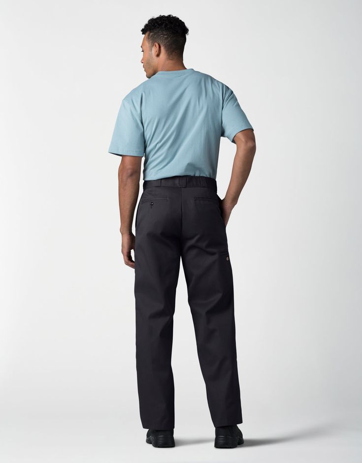 Any job is easier with Dickies’ Loose Fit Double Knee Work Pants, that work with you at a great value. Your knees don’t need back-up for blow outs because there’s a fabric reinforcement that keeps you covered. These work pants have a roomy fit in the seat and thigh that makes bending and kneeling more comfortable, while the polyester/cotton blend spells durability at a value. Multi-use pockets on the leg and back are a nice supplement to the heavy-duty belt loops that hold even the heaviest tool Straight Leg Work Pants With Belt Loops, Black Relaxed Fit Work Pants With Welt Pockets, Black Chinos For Work With Straight Hem, Black Relaxed Fit Cargo Pants For Workwear, Relaxed Fit Work Pants For Business Casual, Black Pants With Hip Pockets For Work, Black Work Pants With Side Pockets, Relaxed Fit Tapered Leg Work Pants, Relaxed Fit Work Pants With Standard Cut Leg